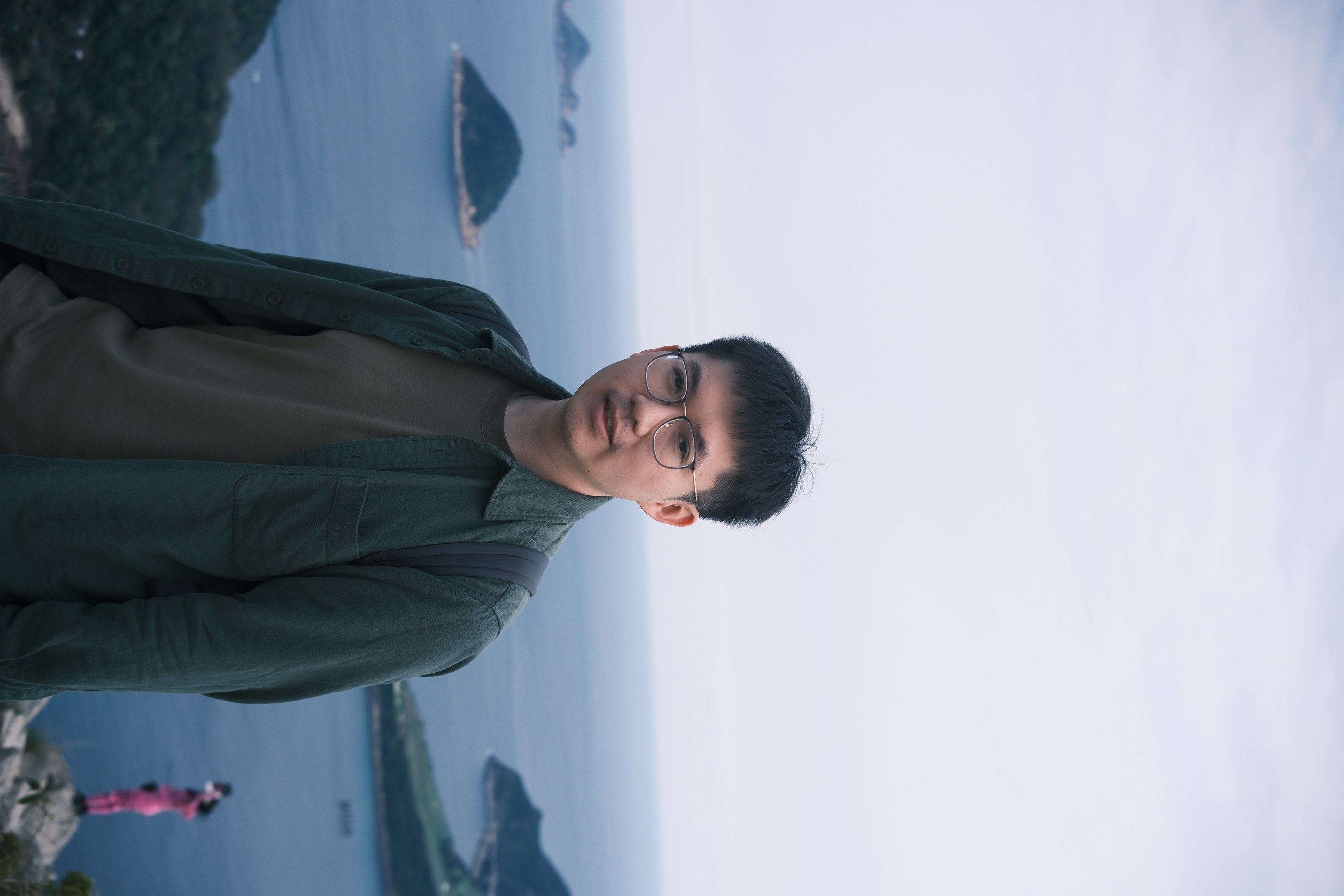 Zeming Wu beside the coast